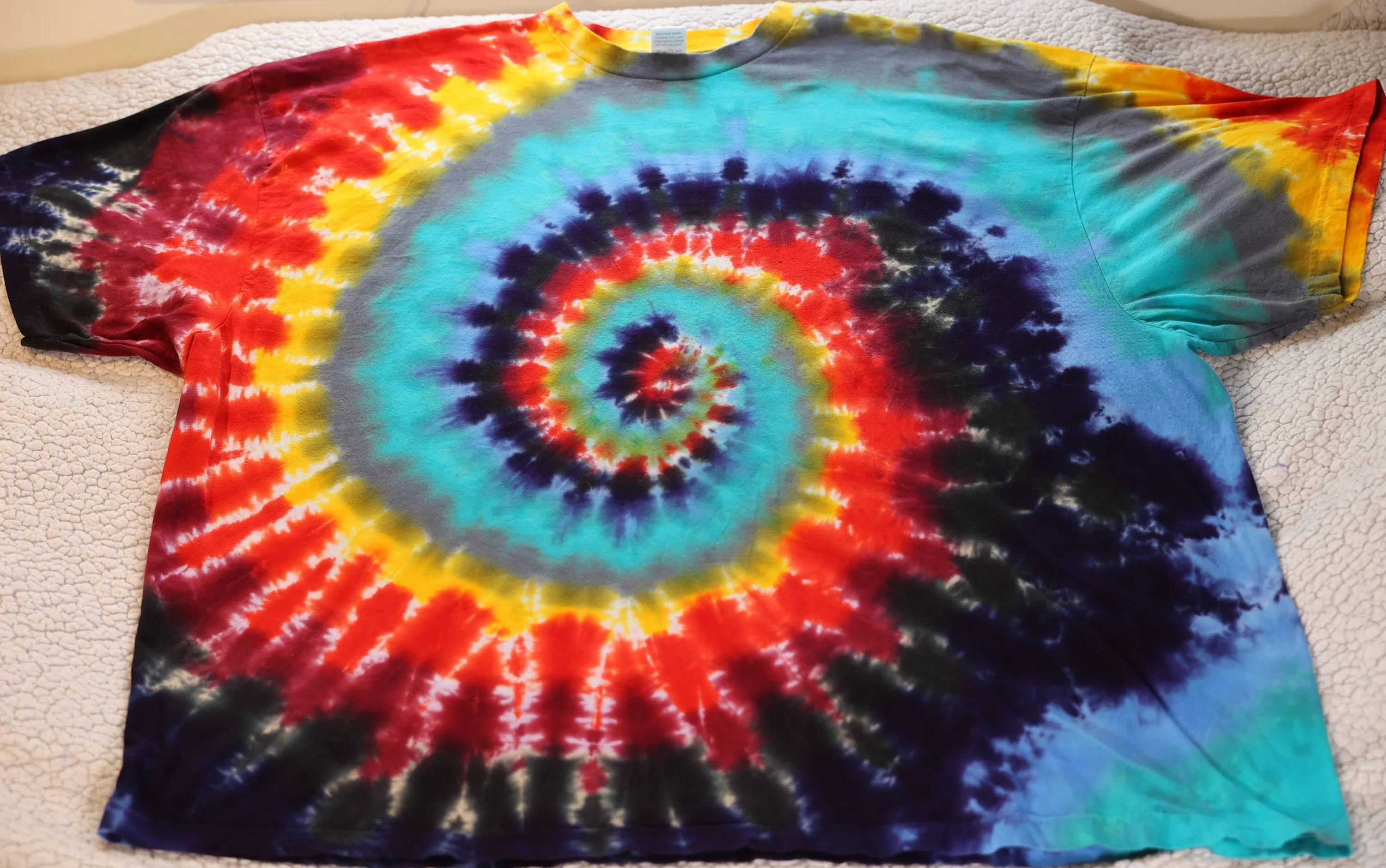 4X Spiral Tie Dye on a Premium Dancing Robin* Ringspun Cotton T-Shirt