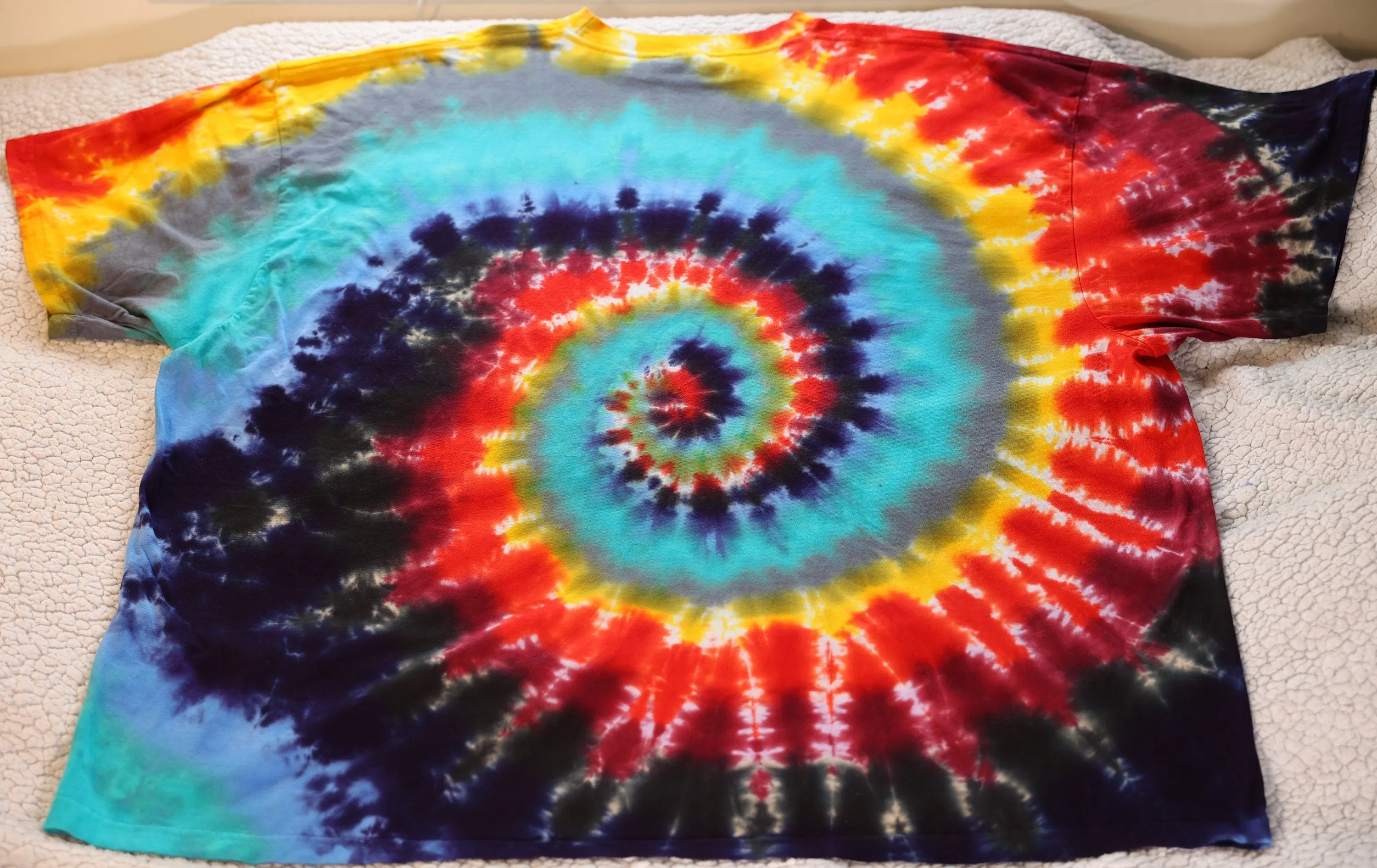 4X Spiral Tie Dye on a Premium Dancing Robin* Ringspun Cotton T-Shirt