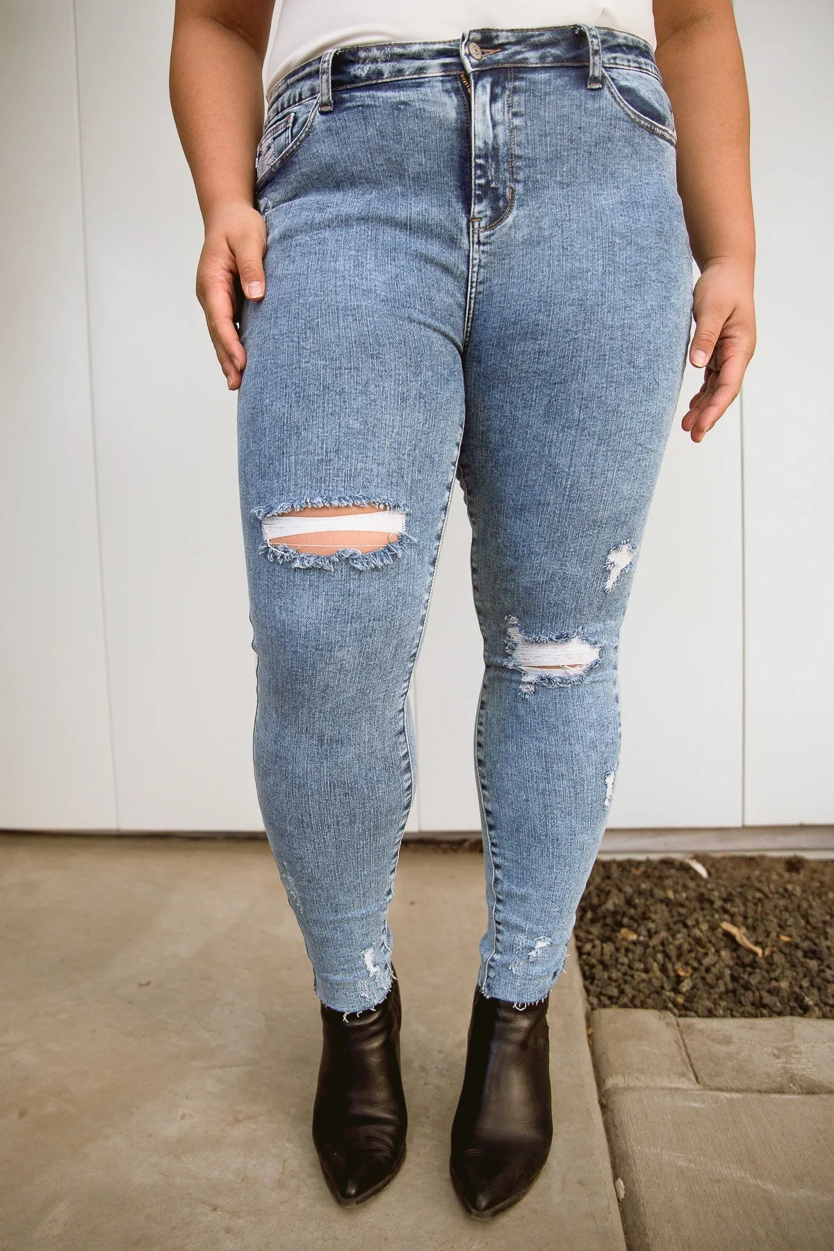 Acid Wash Destroyed Hem Skinny Jeans