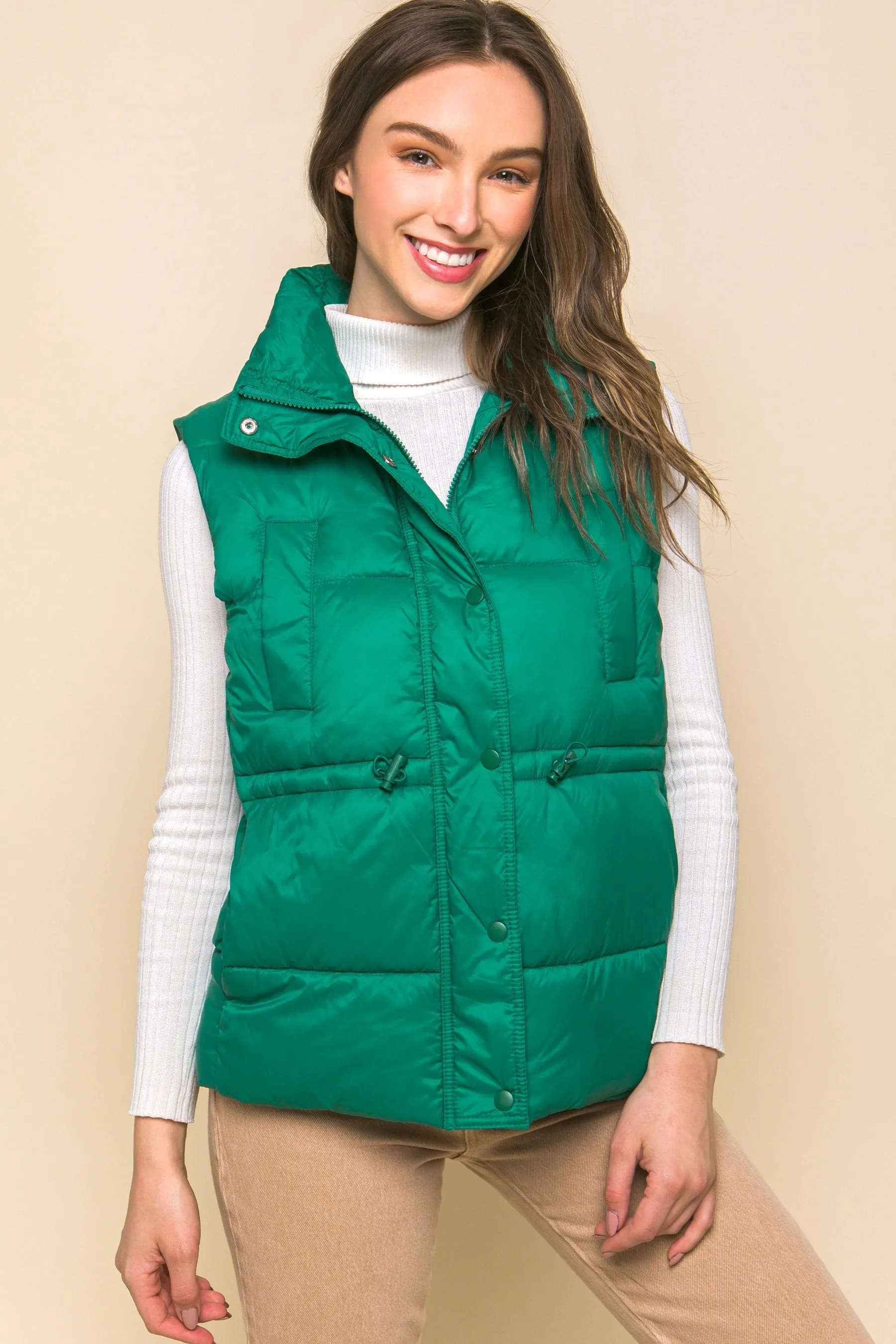 Women's Color Zip up button puffer vest with waist toggles